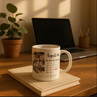 Mug with a calendar design on a wooden desk with a laptop and plant in the background